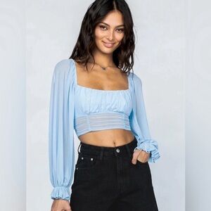 Princess Polly light blue crop top with sheer, flowy long sleeves